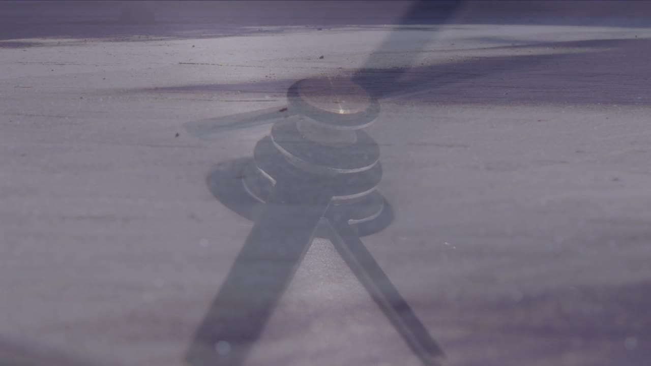 Animation of wow text over people walking in bright background