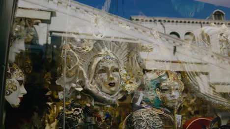 elaborate masks in venetian storefront