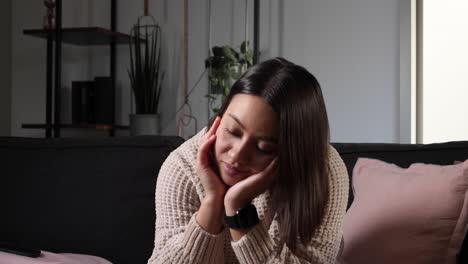 Beautiful-young-asian-woman-thinking-about-things-and-rest-head-in-hands