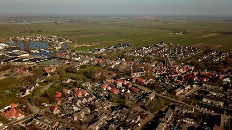 Aerial-of-Oldemarkt,-panning-shot-of-the-town-on-a-sunny-day