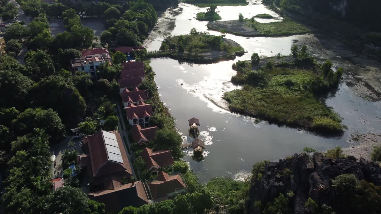 Aerial sunset reveal, popular Vietnamese vacation resort, adventure break