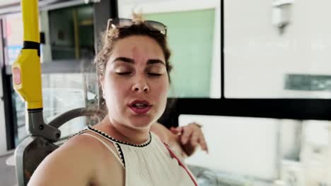 tourist vlogger recording on athens public bus