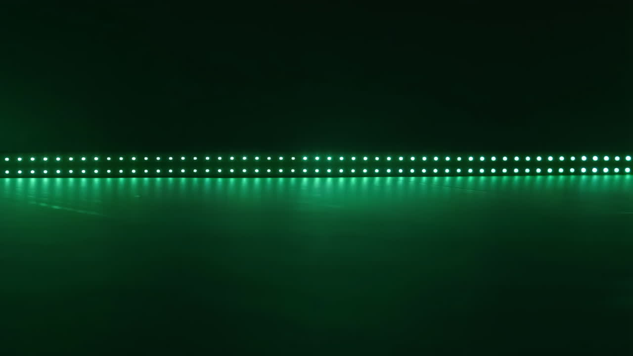 Green LED Light Strip with Reflection on Dark Background