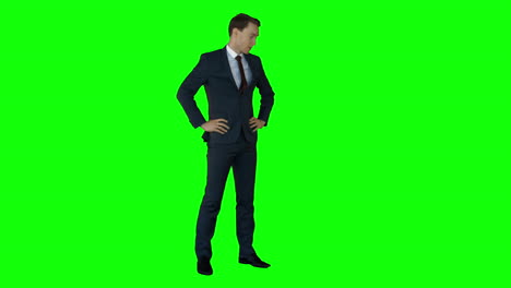 irritated businessman on green screen