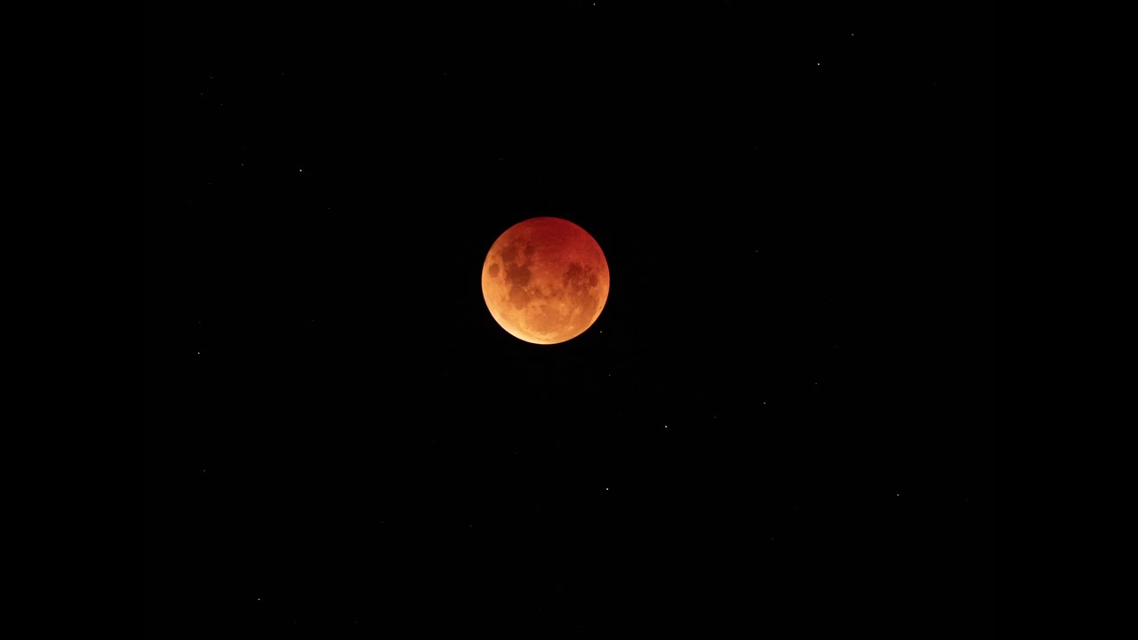 Motion Of Bloody Moon Moving At The Night Sky. - timelapse shot