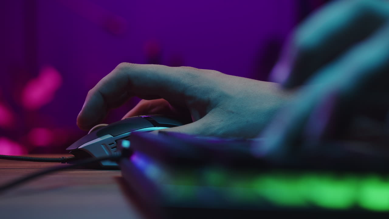 Hands Typing and Clicking on Gaming Keyboard and Mouse