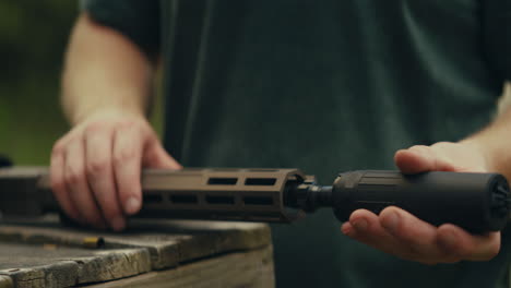 attaching a suppressor to a rifle