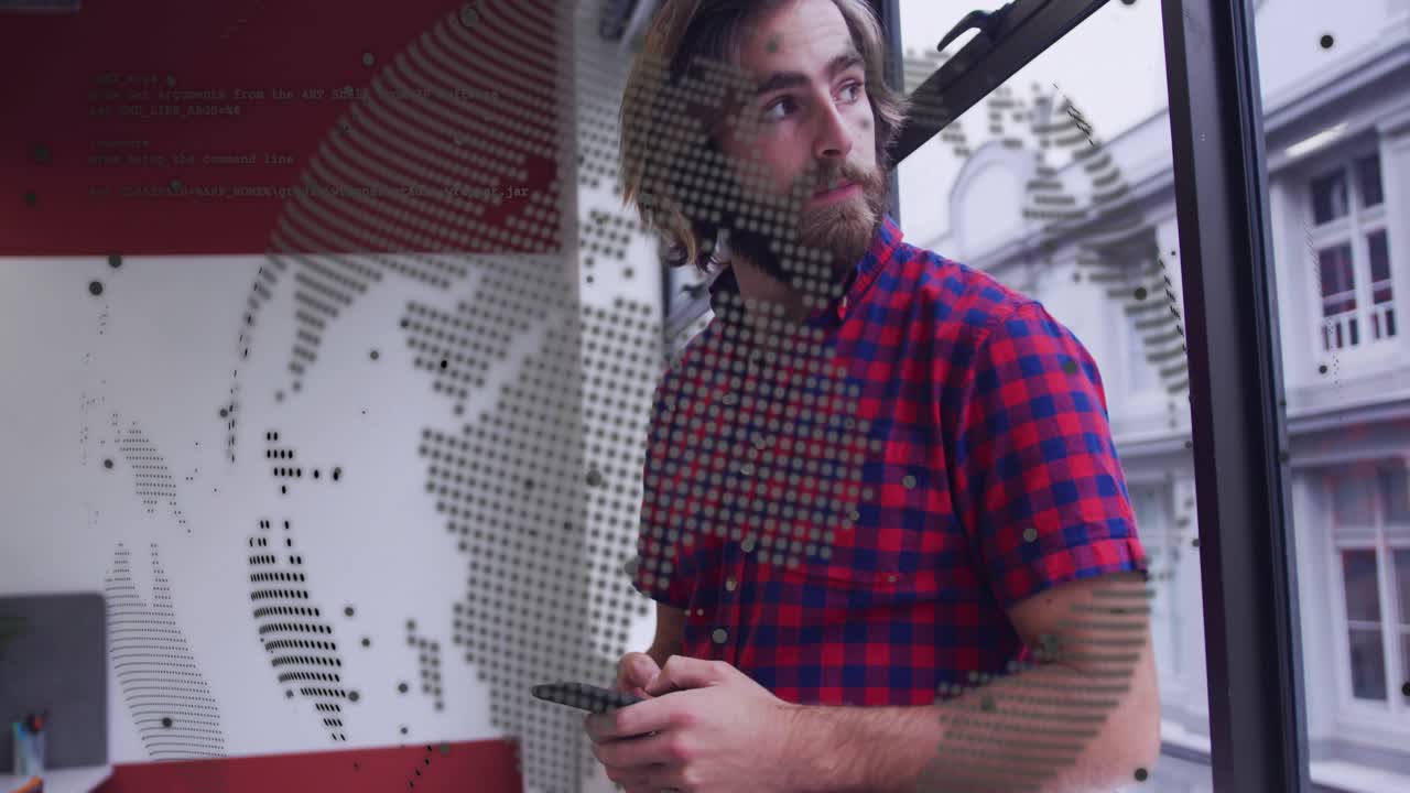 Man looking down at phone, checking tech messages while dotted globe decal overlaying view