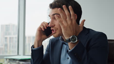 annoyed manager shouting mobile phone closeup. mad entrepreneur calling partner