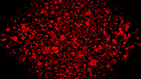 red splatters on black background