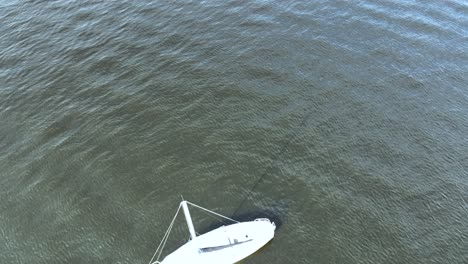 ships in muskegon lake, tilting to bird's eye over one