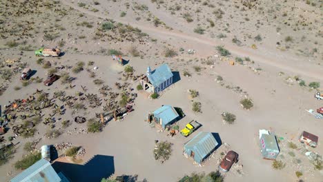 Abandoned-Church-And-Houses-Of-The-Nelson-Ghost-Town-At-Nevada,-USA---Aerial-Shot