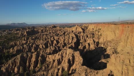 desert mountains. badlands. aerial view. low-altitude flight. eroded mountains with strange shapes. gullies, ravines, and gorges. viewpoint of the end of the world. purullena, granada, spain