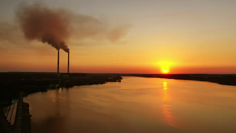 smoking chimney from factory. air pollution by smoke from factory chimneys