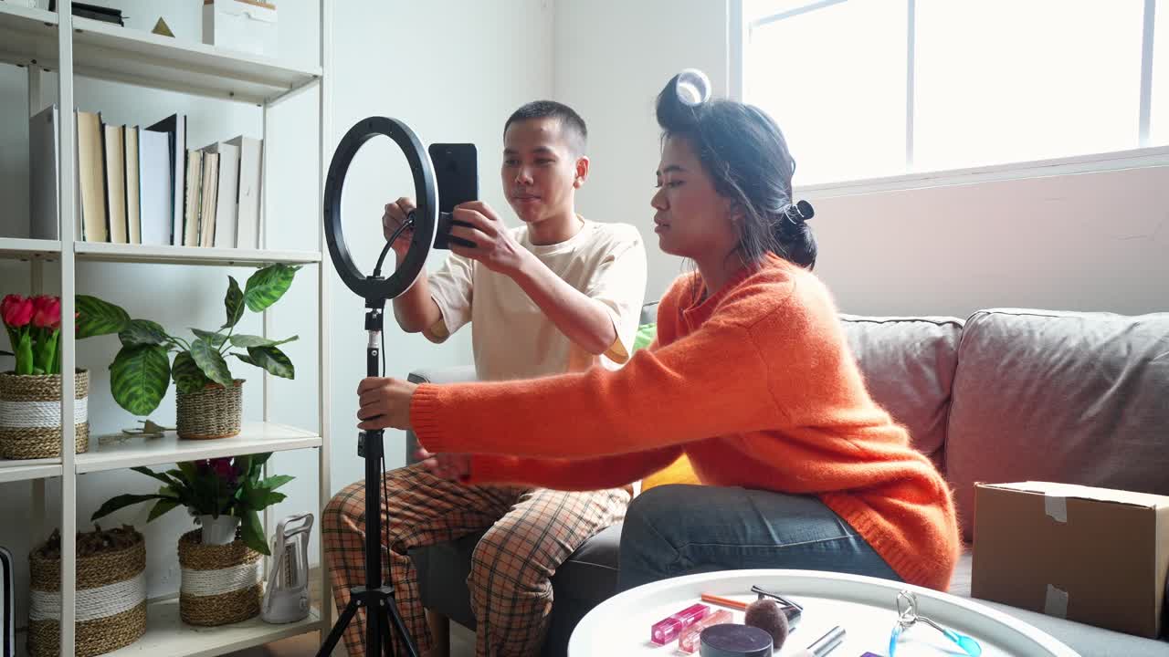 Young Couple Making a Video Vlog at Home