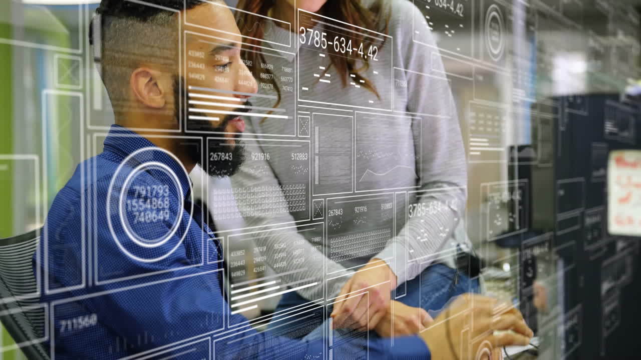 Collaborating with digital data overlay, business professionals in office setting