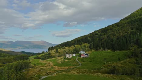 Aerial-over-typical-secluded-houses-near-Lauvstad-in-the-Volda-Municipality,-Norway