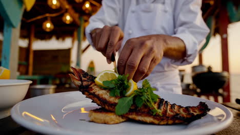 chef preparing grilled seafood at beach restaurant