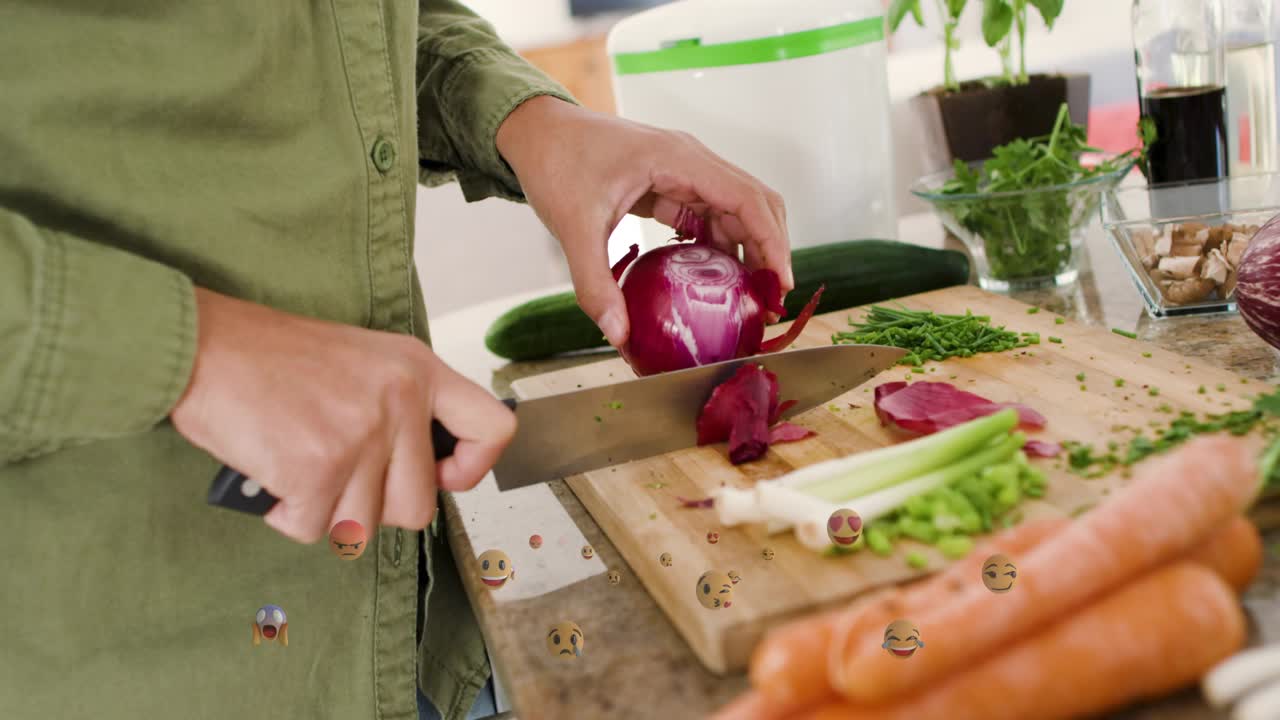 Woman steadying red onion left, guiding chef knife right, slicing, emoji overlays marking meal prep