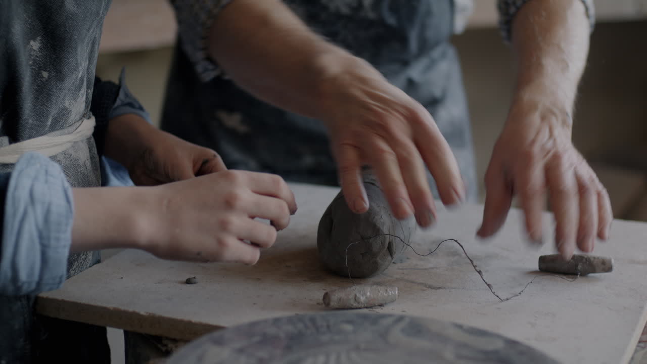 Pottery Class: Student Learning From Master Craftsman