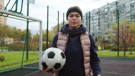 woman holding a ball