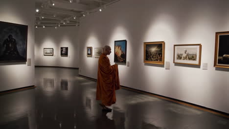 monk in an art gallery