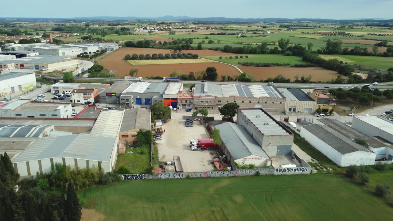 Aerial view of industrial area and farmland