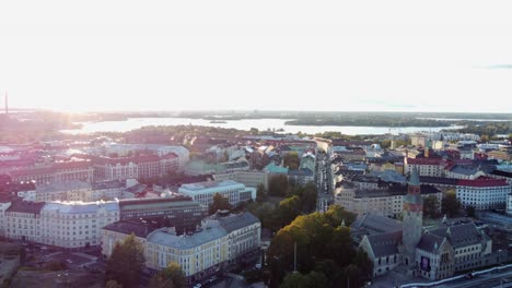 High-key-sunset-aerial-over-Baltic-harbour-city-of-Helsinki-Finland