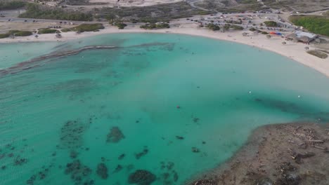 turquoise and caribbean waters in baby beach, aruba