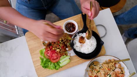 cooking and plating stir-fried pork belly