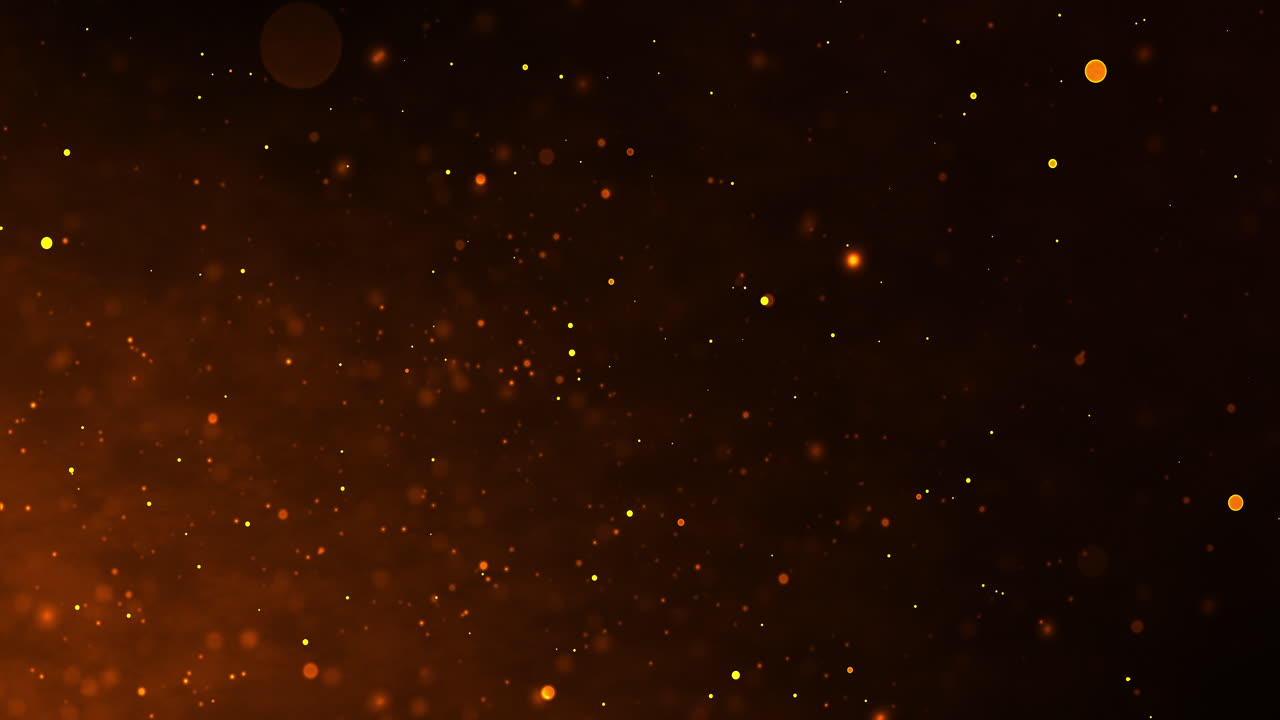 Abstract sparkling orange particles background