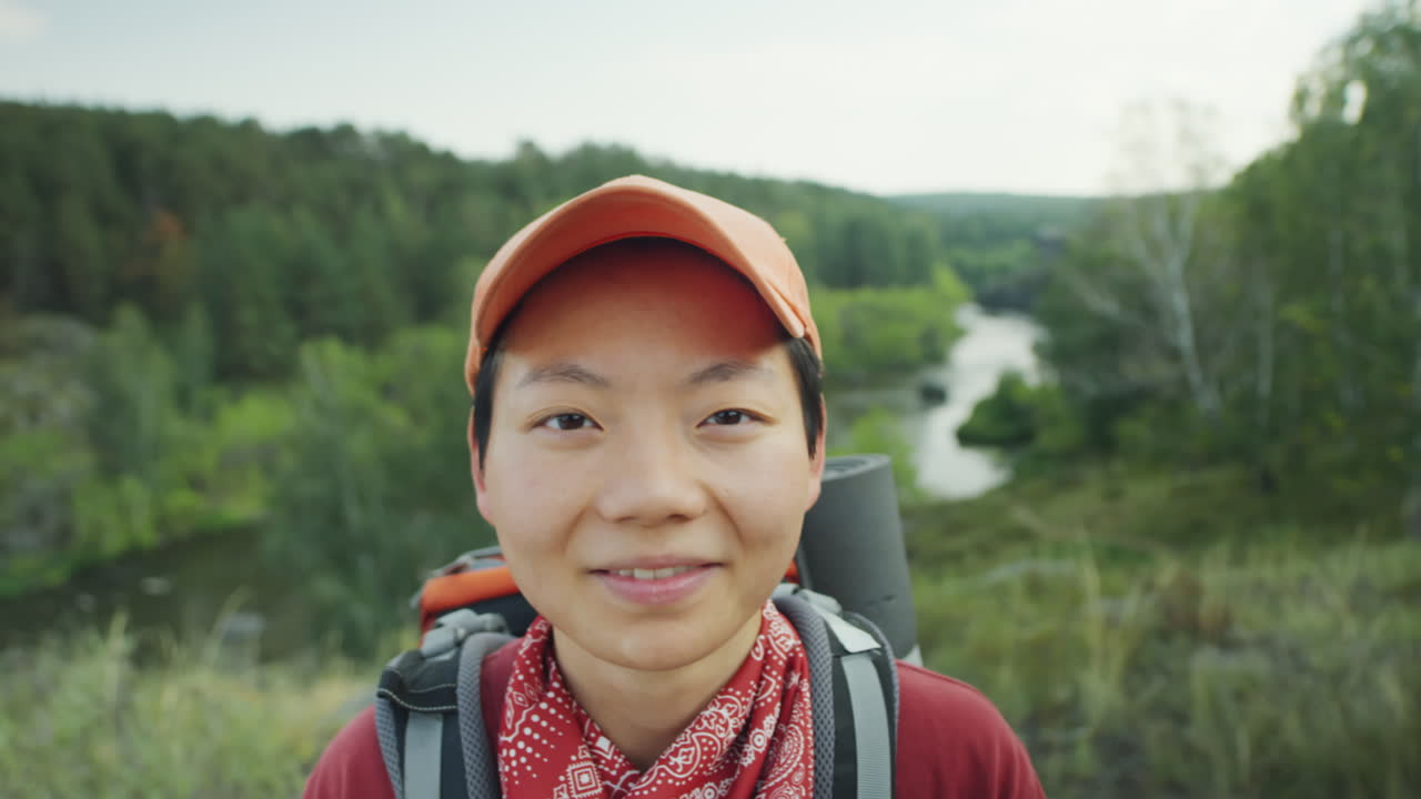 Portrait of Cheerful Asian Woman on Hike