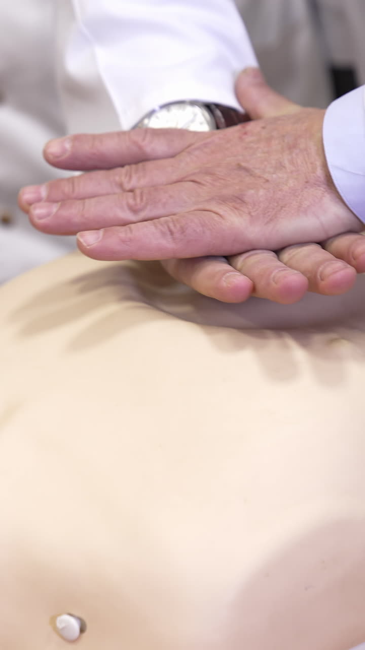 CPR training medical procedure workshop. Model dummy for CPR training in medical class. Vertical video