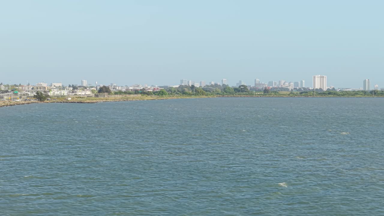 An aerial panning view of the Berkeley shore taken by a drone from Albany Bulb.
