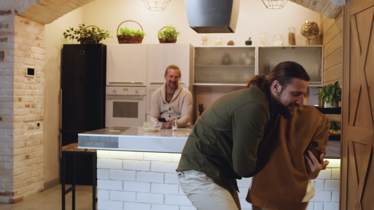 Caucasian men and boy at home