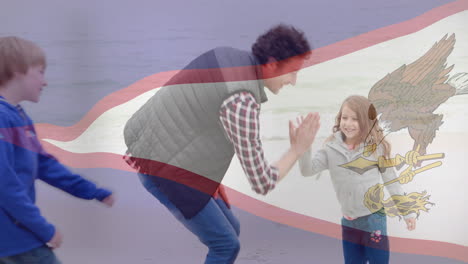 padre e hija en la playa con la bandera de las islas vírgenes animada