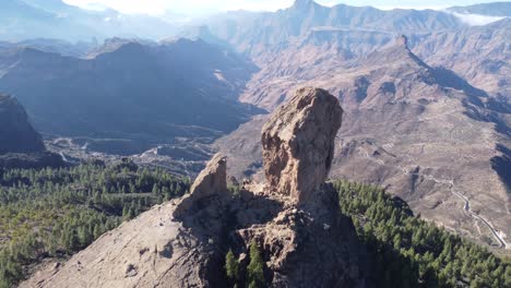 Flight-over-of-Roque-Nublo,-a-volcanic-rock-in-caldera-of-Tejeda,-Gran-Canaria,-Canary-islands,-Spain