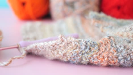 close-up of crochet project with yarn and crochet hook