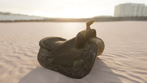 old-horse-saddle-on-the-beach