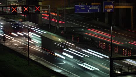 dense traffic captured in a dynamic long-exposure timelapse on the antwerp city's r1 ring road in belgium