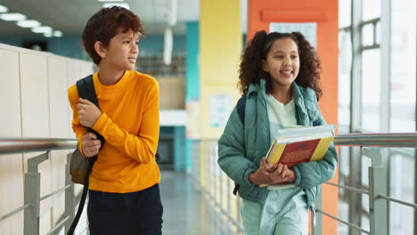 students walking in school hallway