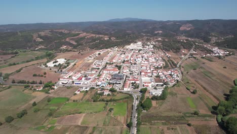 wide view flying over the beautiful aljezur city in portugal