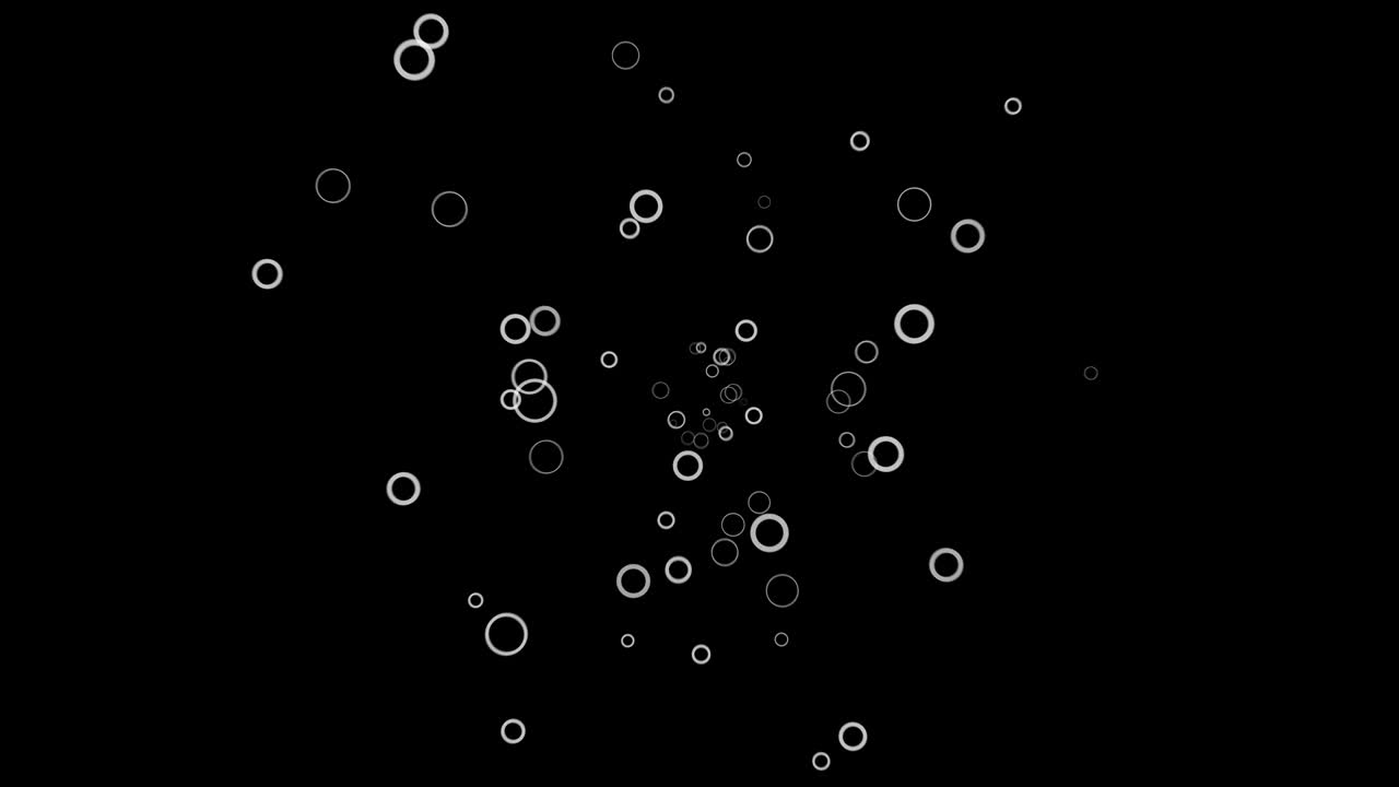 추상적인 색 반지는 검은색 배경에서 카메라에 가까워집니다. 애니메이션. 많은 움직이는 작은 원 프레임, 모노크롬