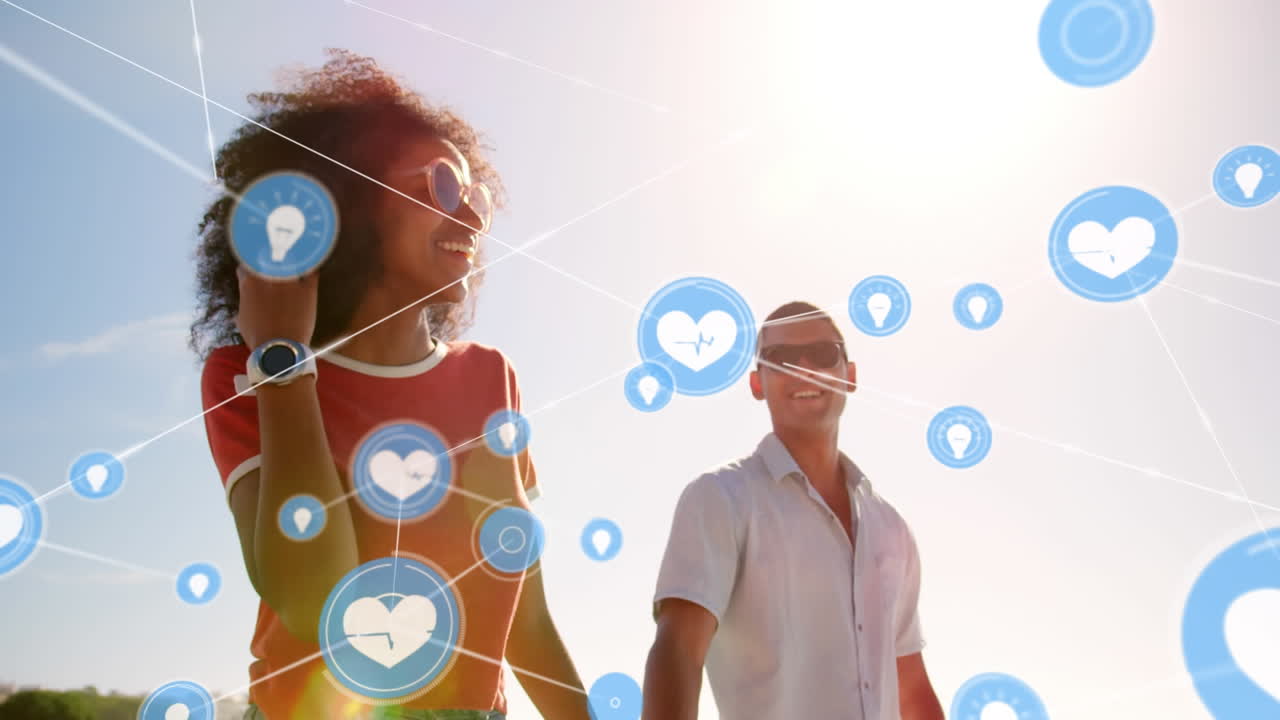 animación de una red de conexiones sobre una pareja feliz en la playa