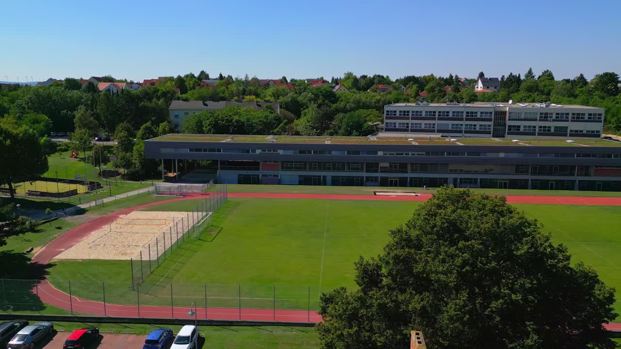 Mistelbach, Nieder&ouml;sterreich, Austria - Multiple Schools, With a Football Field at its Core - Aerial Pan Right