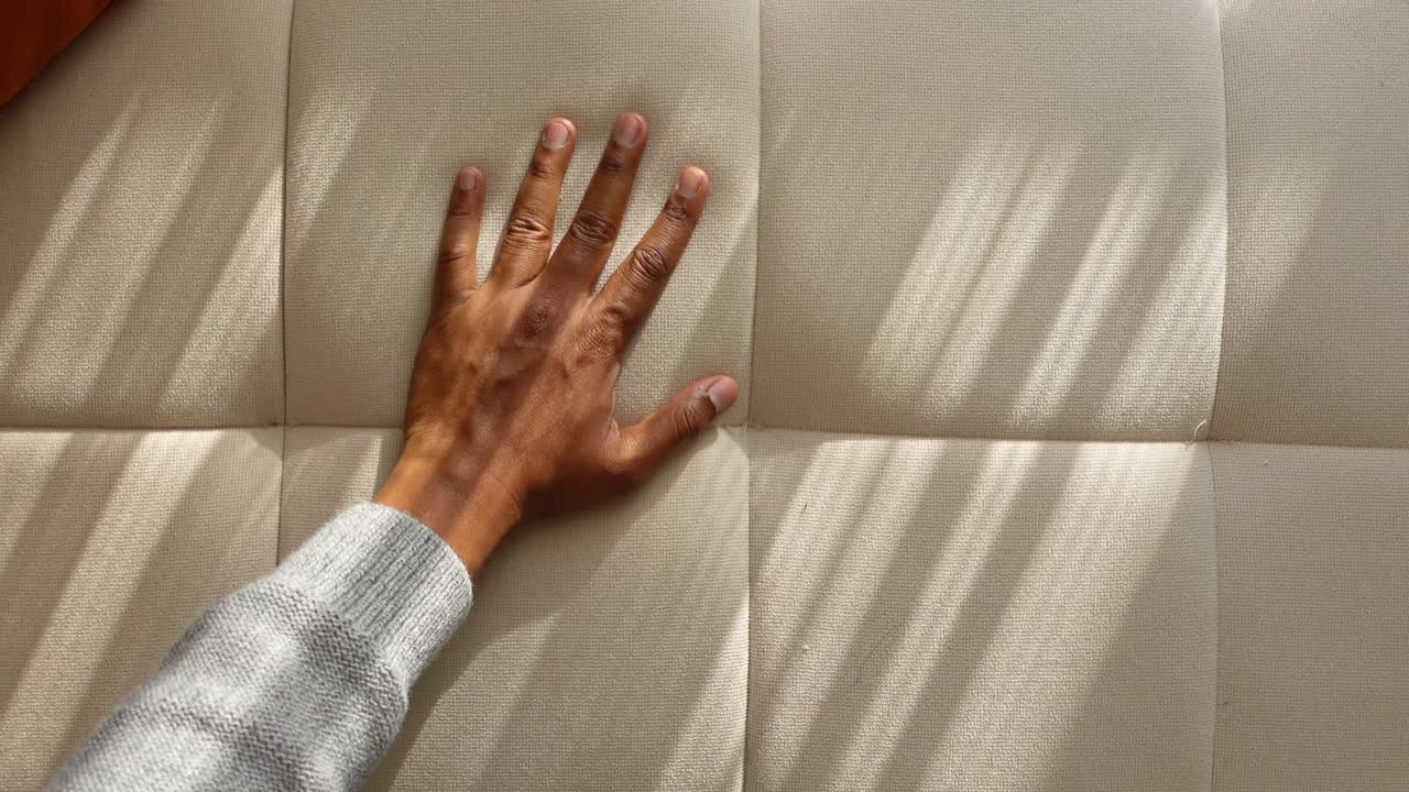 Hand on a Couch
