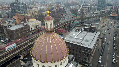 Slow-motion-drone-Brooklyn-Weylin-city-skyline-and-train-overpass