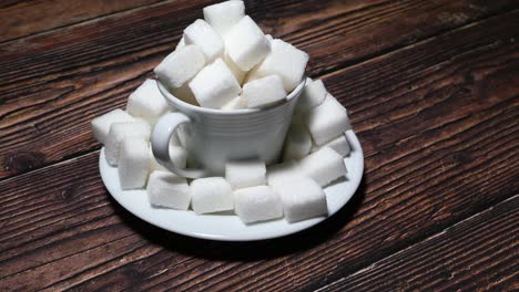 sugar cubes in a white cup