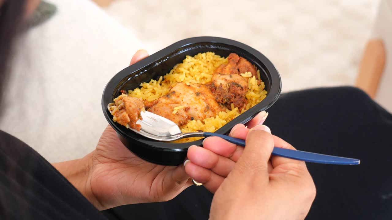 Person Eating Chicken and Rice Meal | Premium Stock Video Footage