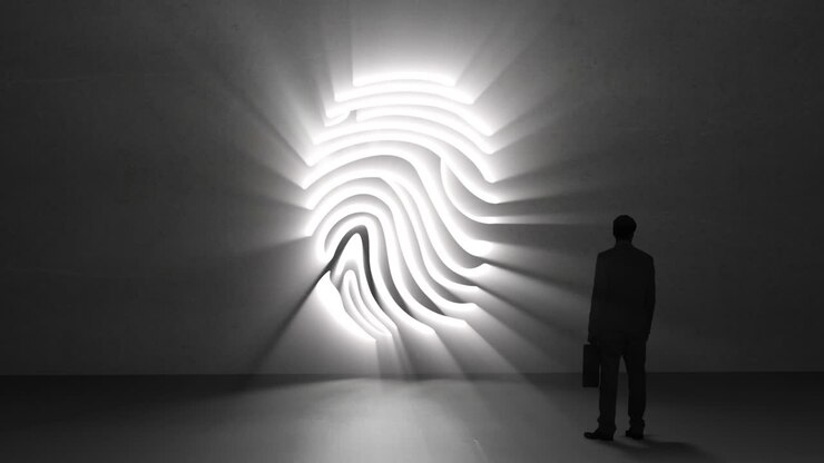 Businessman looking at giant fingerprint